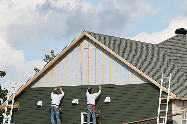Professional Siding Repair technician working in Worthington, KY